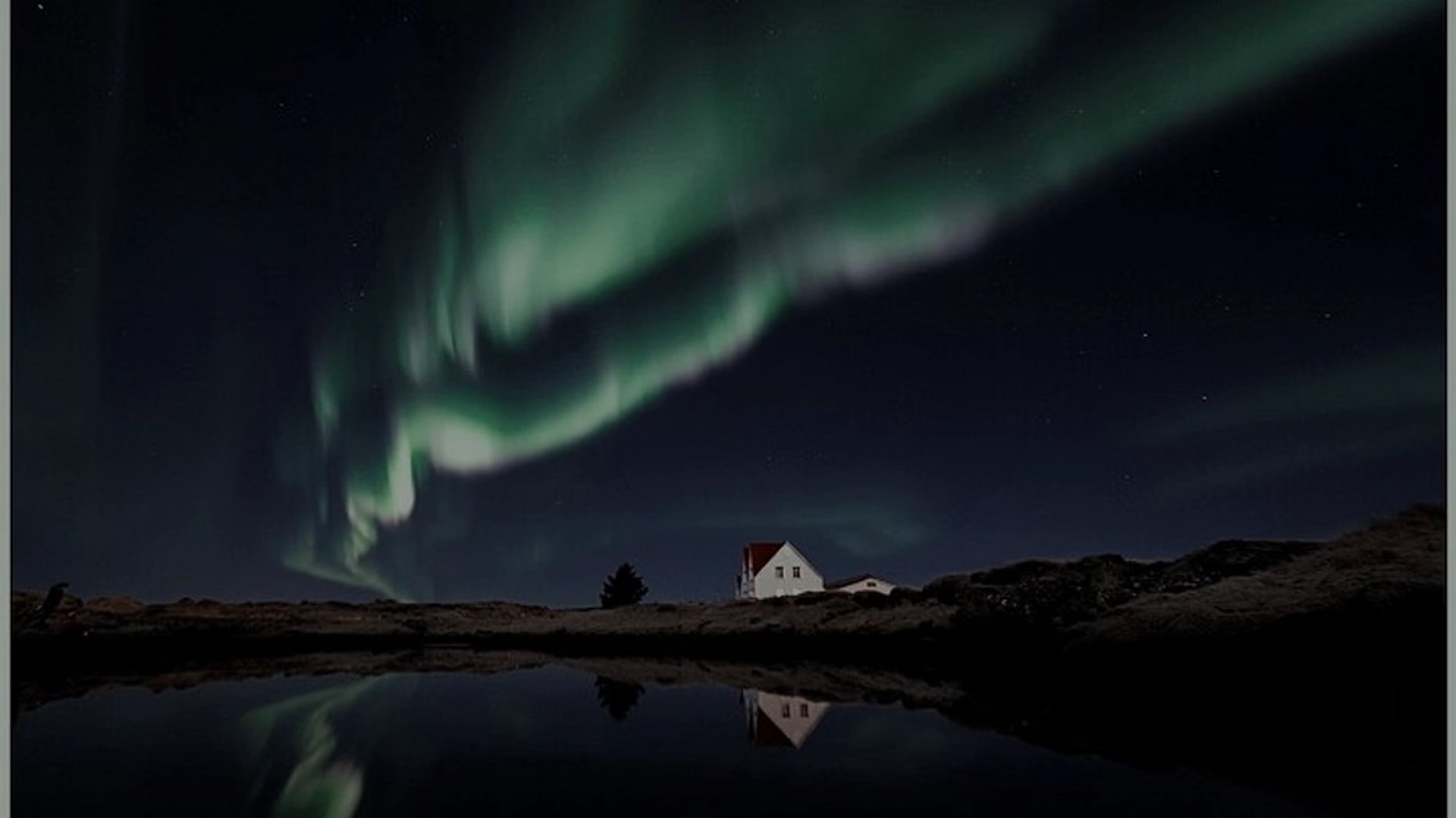 Breathtaking aurora borealis display over Iceland's winter landscape