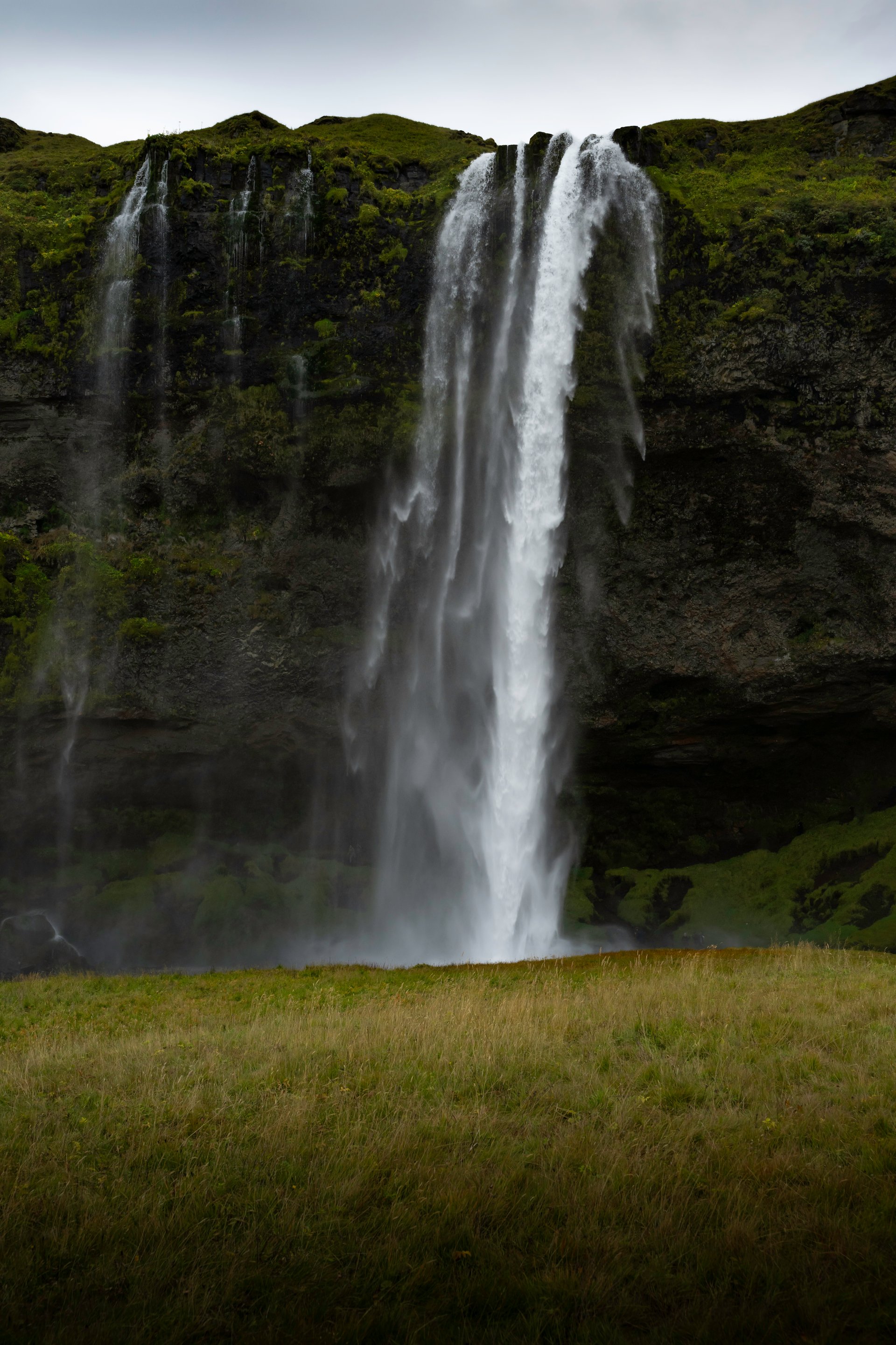 Happy travelers exploring Iceland's unique landscapes with expert guide