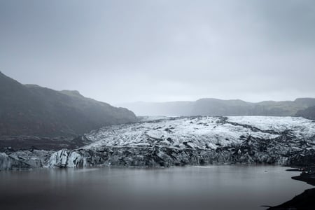 The mouth of the mighty glacier of Sólheimajökull on a misty day