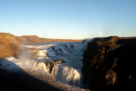 Gullfoss waterfall between shade and sun