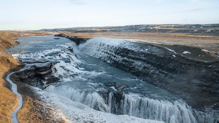 The waterfall of Gullfoss under a bright sunny day