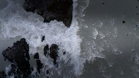 The sea stacks of Reynisdrangar at sunset in Iceland
