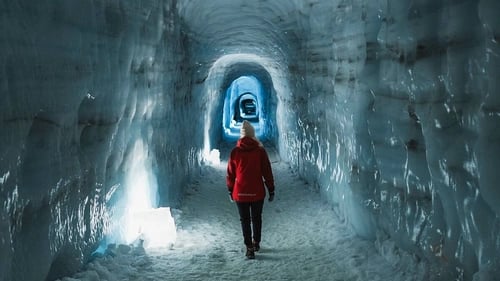 Inside Langjökull Glacier ice cave with blue crystal formations