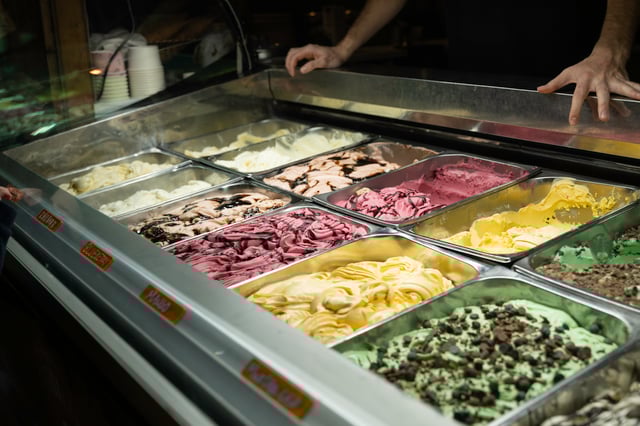 Cows eating hay in the Efstidalur farm.