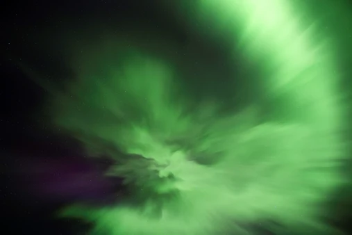 Green Northern Lights illuminating the Icelandic sky