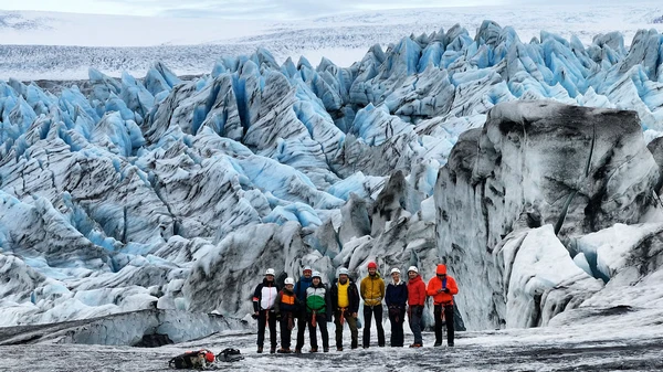 Ethereal blue light filtering through ancient glacier ice formations