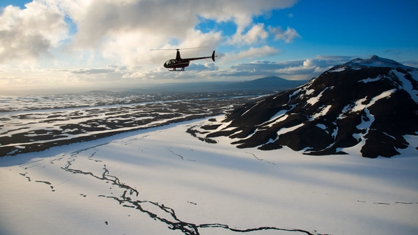 Helicopter over an icelandic glacier