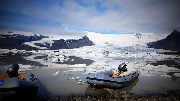 Passengers enjoying intimate iceberg viewing experience