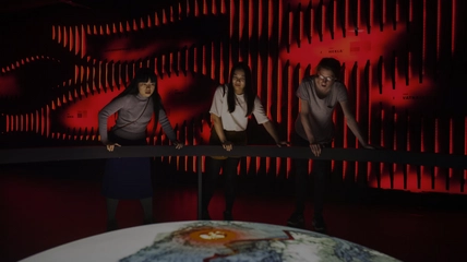 Visitors exploring interactive volcanic exhibits at LAVA Centre