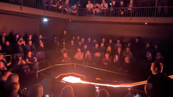 Speaker playing with red hot lava at the lava show