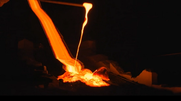 Glowing molten lava flowing across demonstration surface