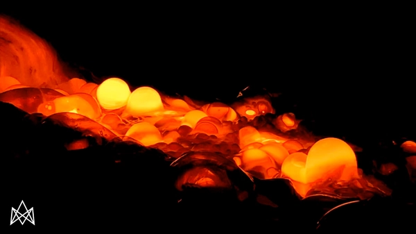 Close-up of cooling lava texture formation during show
