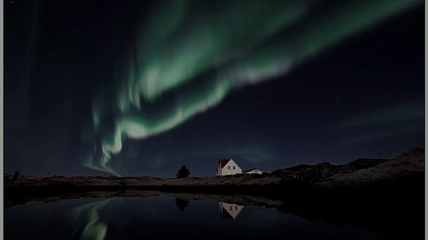 Breathtaking aurora borealis display over Iceland's winter landscape