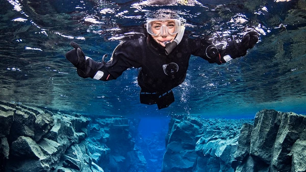 Group of snorkelers preparing for the ultimate continental drift experience