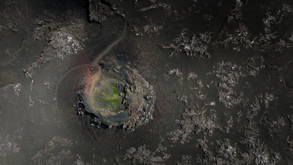 Aerial photo of a volcanic crater in an immense lava field of the Reykjanes Peninsula