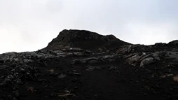 A dark volcanic crater