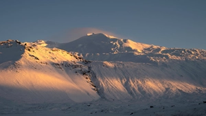 The top of the Snæfellsjökull Volcano under the snow at sunset