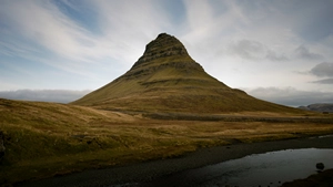 Mount Kirkjufell in the summer time. The most beautiful mountain in Iceland