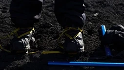 Close up of crampons as they are worn prior to a glacier hike tour